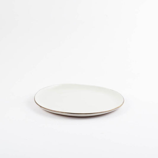 Small ceramic plate with gold plated edge